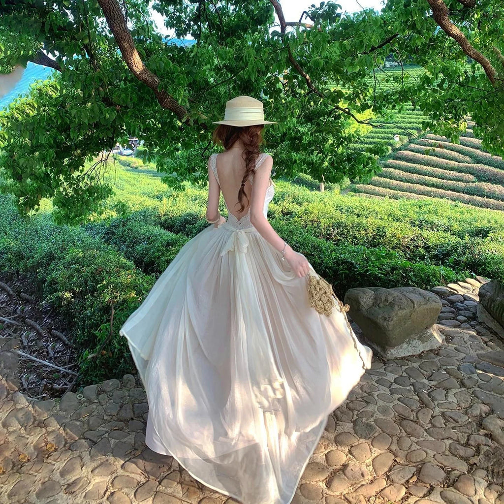 Elegant Lace Backless Strap Dress Women's Gentle Vacation Style Long Dress Sexy Beach Holiday Dress Polyester Fabric High Wai...
